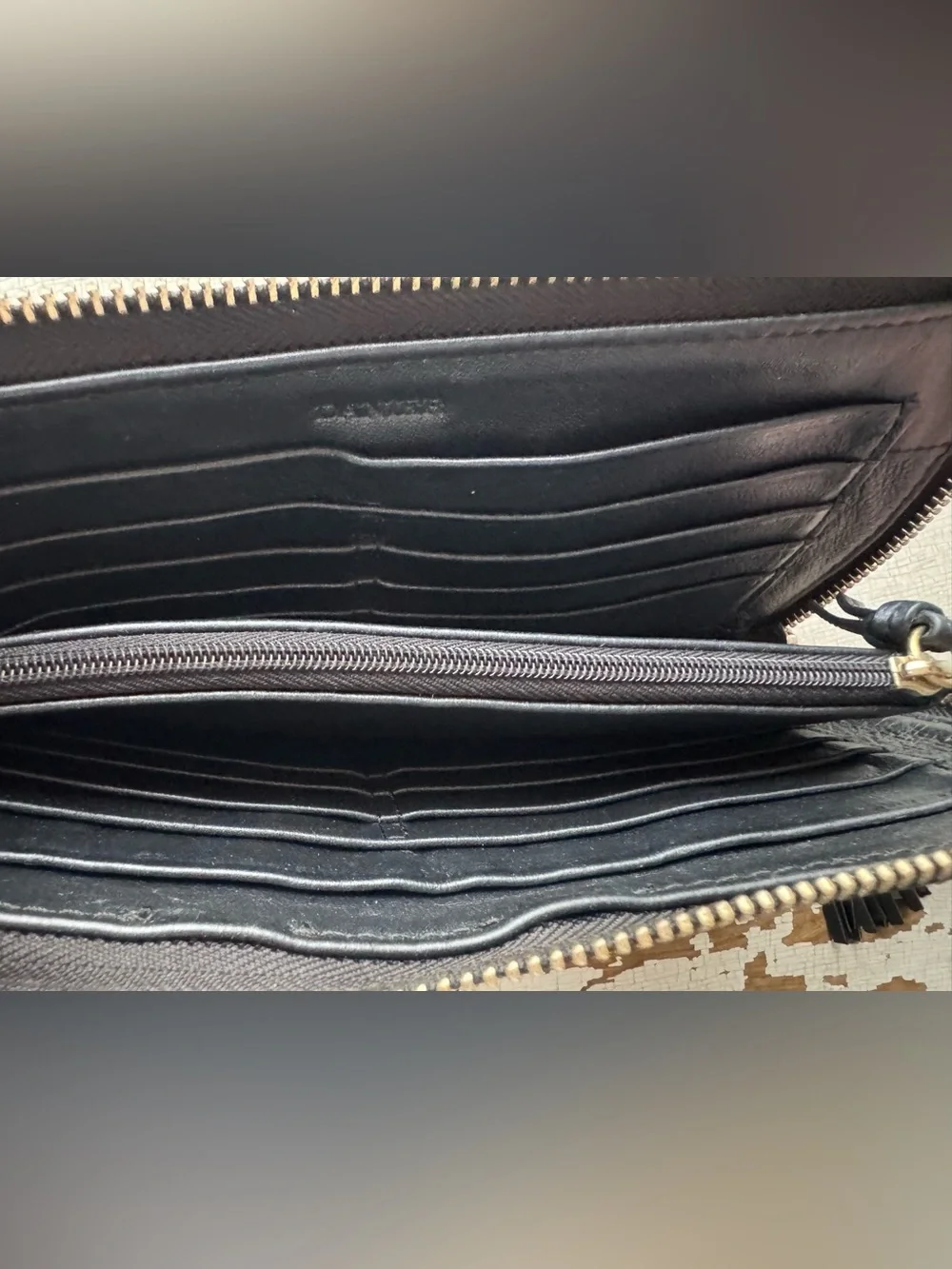 Danier Black Zip-Around Tassel Wallet - Picture 2 of 3